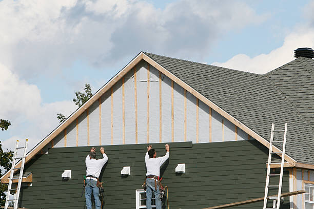 Professional Siding technician working in Rock Creek, OH